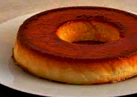 Aprenda a fazer um pudim de pão de forma irresistível